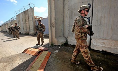 قوات التحالف المحتلة تسلم قاعدة بسماية العسكرية إلى القوات العراقية