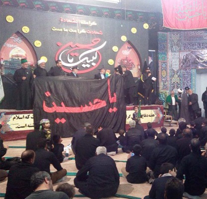 العتبة الحسينية تبتعث رايات الحزن الى ايران 