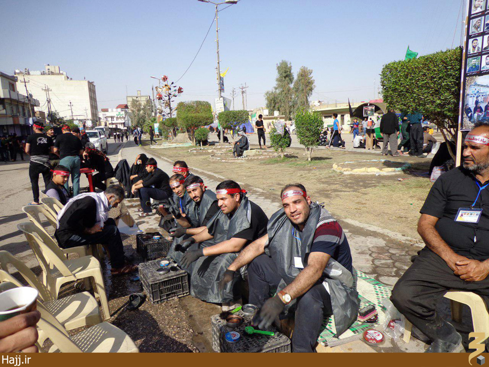 صبغ احذية زوار مشاية الامام الحسين