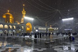 بارش باران و برف در حرم مطهر رضوی