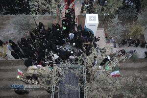 مراسم تدفین پیکر پاک شهید گمنام دفاع مقدس در مدرسه علمیه خواهران حضرت آمنه