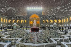 بارش باران و برف در حرم مطهر رضوی