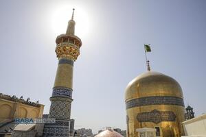 آیین تعویض پرچم گنبد منور رضوی در روز میلاد حضرت امام رضا (علیه‌السلام)